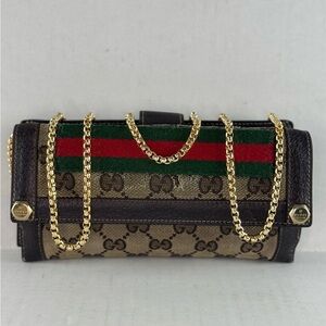 Vintage Web shops GG Monogram wallet.